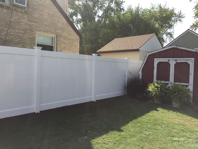 White vinyl privacy fence installed in Downers Grove, Illinois