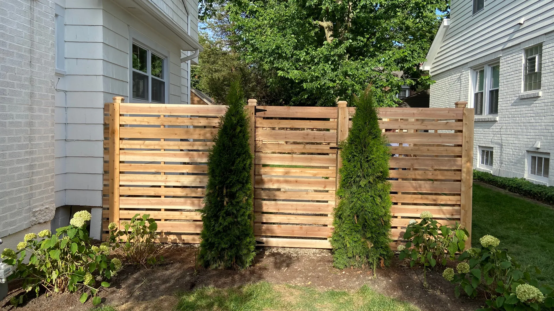 6' Horizontal Spaced Picket Cedar install in Elgin